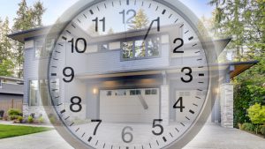 A transparent clock image with a large home behind it and the title Right Time to Refinance